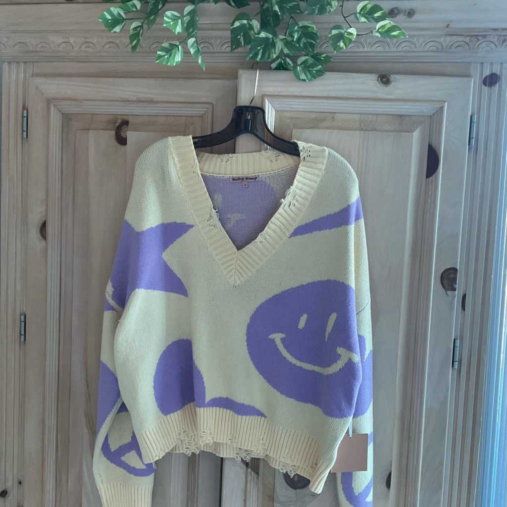 Purple And Cream Women's Smiley Face Sweater $25